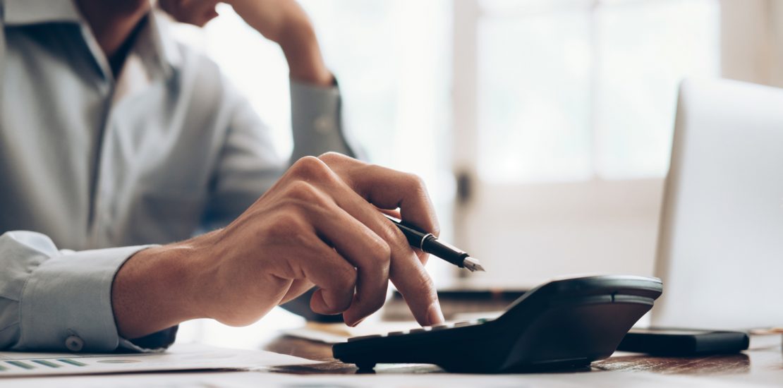 decorative image - businessman calculating