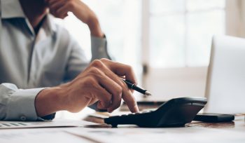 decorative image - businessman calculating