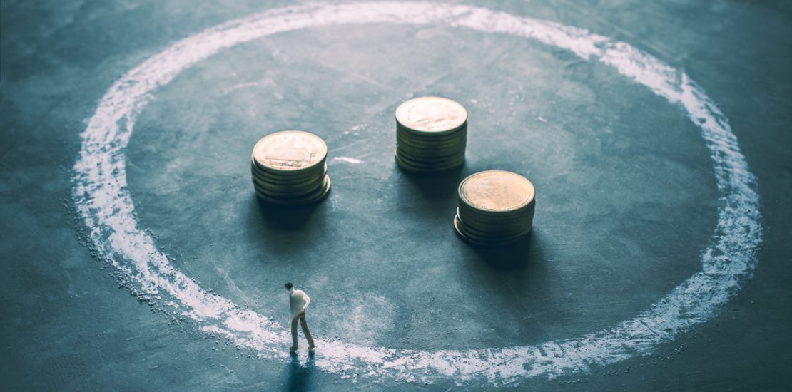 miniature figure businessman walking around outside chalk circle with coin